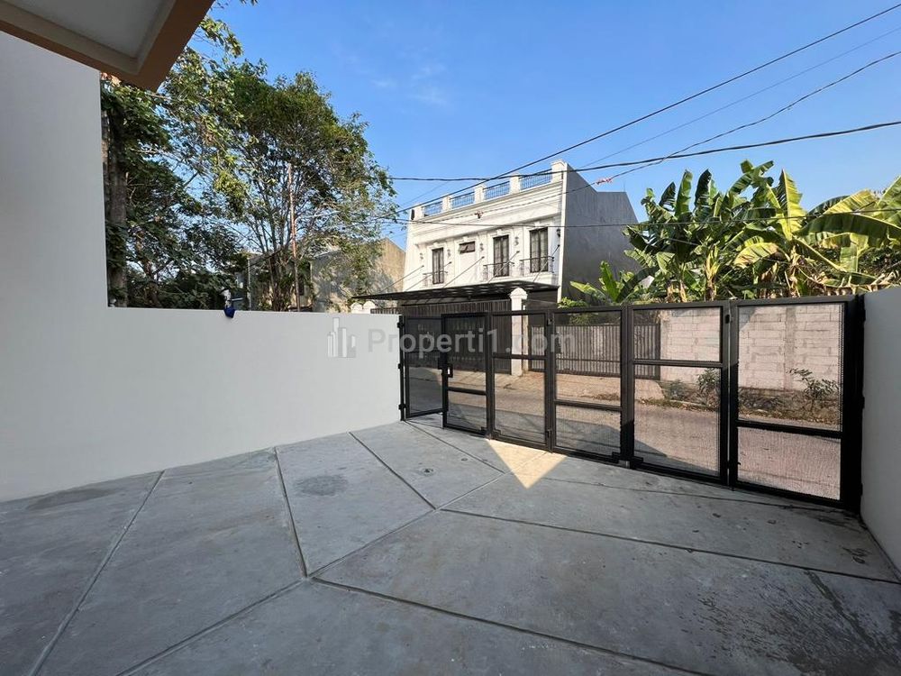 Carport muat dua mobil