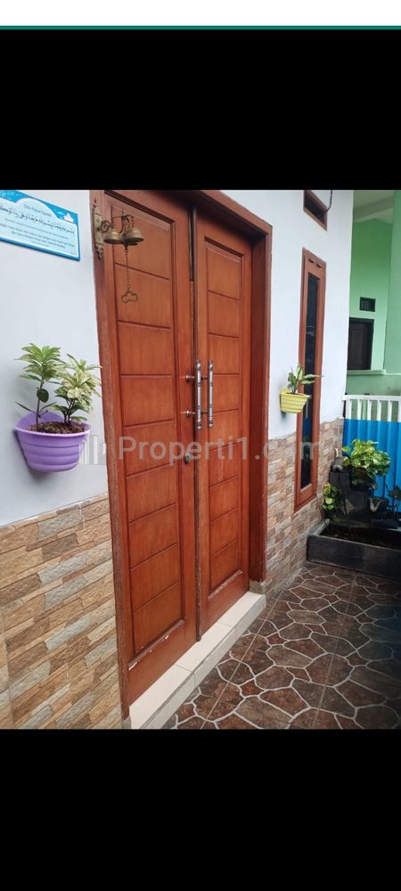 Jual Murah Rumah Second 2 Lantai Layak Huni di Kampung Lio Depok Baru