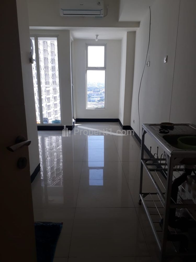 Sewa Cepat Murah Apartemen Amor East Coast Pakuwon City Surabaya Lantai 20 - Stuidio Unfurnished